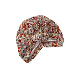 Colorful patterned headscarf on a white background