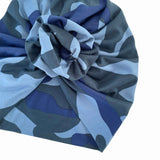 Blue and gray patterned headscarf on a white background