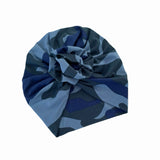 Blue camouflage-patterned headscarf on a white background