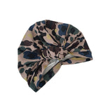 Patterned headscarf with a knot on a white background