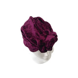 Purple towel on a white background