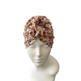 prettied leafy turban hat