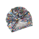 Floral patterned headscarf on a white background