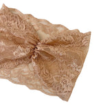 Beige lace fabric on a white background