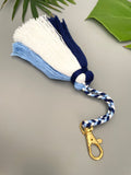 Length: Approximately 23cm/9 inches of tassels including the braided string and the keyring.