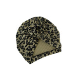 Leopard print turban with a knot on a white background