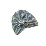 Floral patterned headscarf on a white background