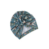 Floral patterned headband on a white background