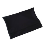 Black rectangular pillow on a white background