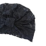 Navy lace headband on a white background