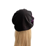 Black beanie on a mannequin head with blonde hair against a white background