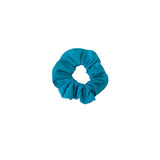 Blue scrunchie on a white background