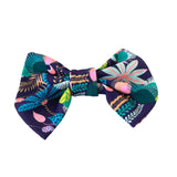 Colorful floral-patterned bow tie on a white background