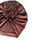 Brown satin headscarf with a large bow on a white background