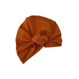 Brown headscarf with a knot on a white background