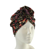 Floral patterned headscarf on a mannequin head against a white background ireland