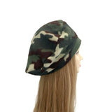 Camouflage-patterned beanie on a mannequin head against a white background