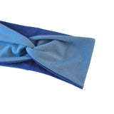 Blue headband with a bow on a white background