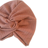 Brown textured headscarf on a white background