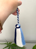 Length: Approximately 23cm/9 inches of tassels including the braided string and the keyring.