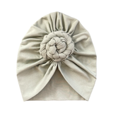 Pastel mint green colour braided rosette turban hat for women.