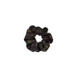 Black patterned scrunchie on a white background