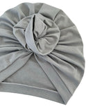 Gray turban with a knot on a white background