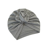 Gray turban hat on a white background