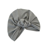 Gray headscarf with a knot on a white background