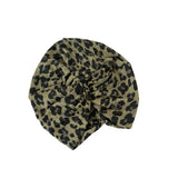 Leopard print headscarf on a white background