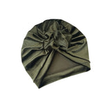 Green turban hat with a bow on a white background