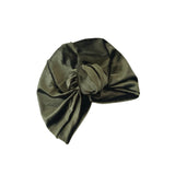 Green satin headscarf with a knot on a white background