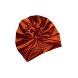 Brown turban on a white background