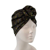 Patterned headscarf on a mannequin head against a white background ireland