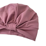 Pink headscarf on a white background