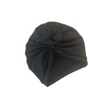 Black turban on a white background