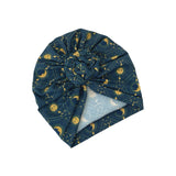 Blue headscarf with gold moon pattern on a white background