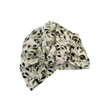 Turban with leaf pattern on a white background