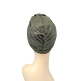 Gray textured headscarf on a mannequin head against a white background ireland