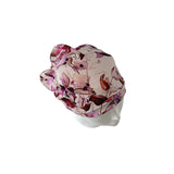 Floral-patterned headscarf on a white background