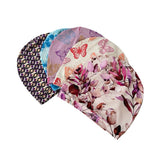 Three patterned headbands stacked on a white background