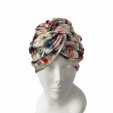 Floral patterned headscarf on a mannequin head against a white background ireland