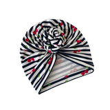 Navy and white striped headband with cherry pattern on a white background