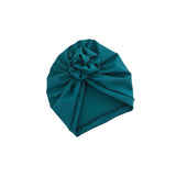 Teal headscarf with a knot on a white background
