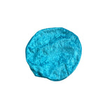 Blue circular object on a white background