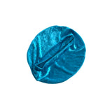 Blue velvet fabric beret hat on a white background