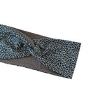 Leopard print headband on a white background