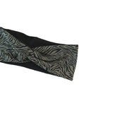 Black and gray zebra print fabric on a white background