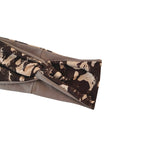 Folded fabric with abstract pattern on a white background