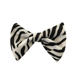 Zebra patterned bow tie on a white background